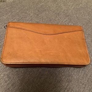 Natural colored leather, zipper closure wallet, never used